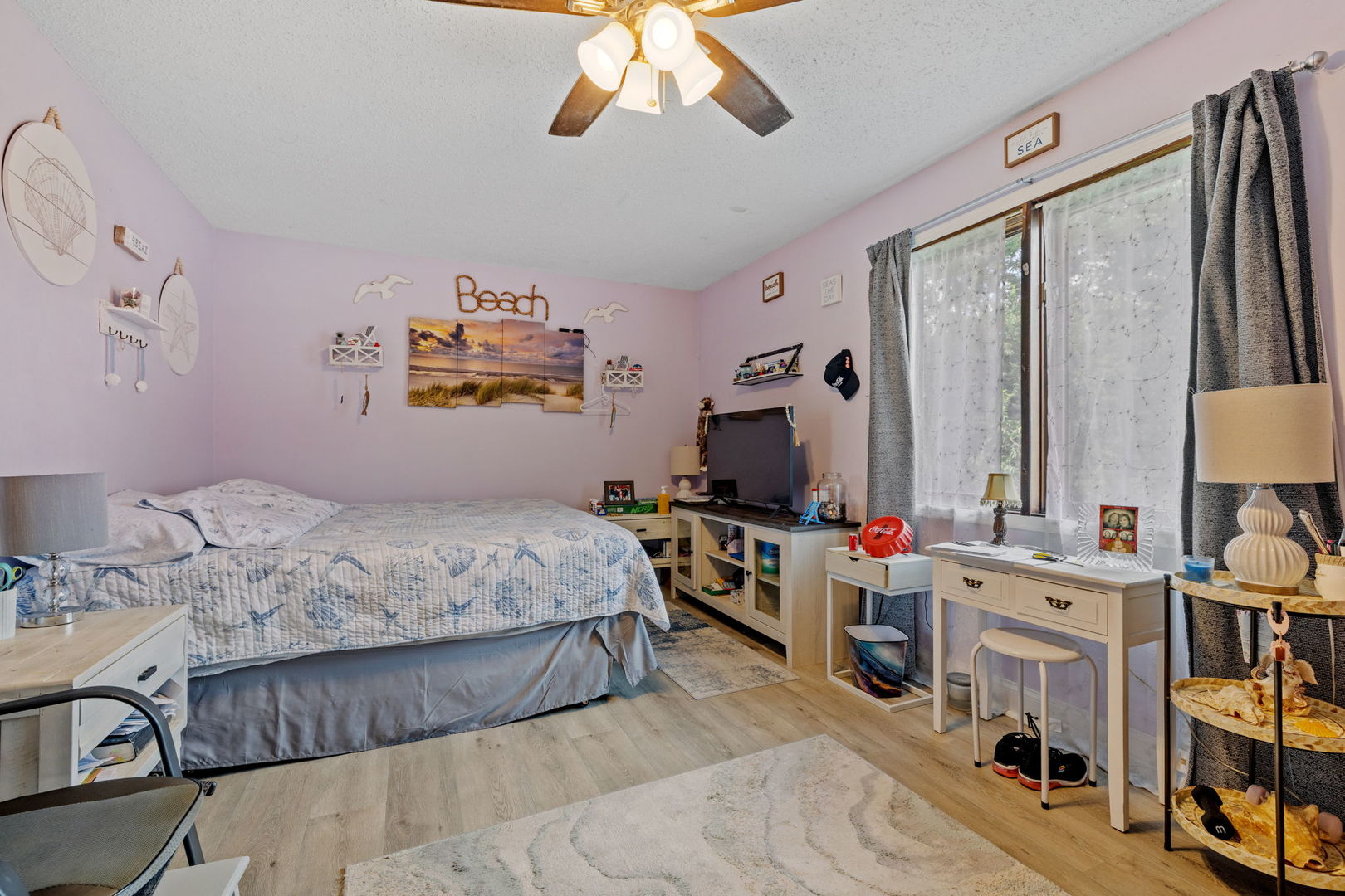4560 West Offner Road Monee, IL 60449 - Photo 8 of 19 a bedroom with furniture and a flat screen tv