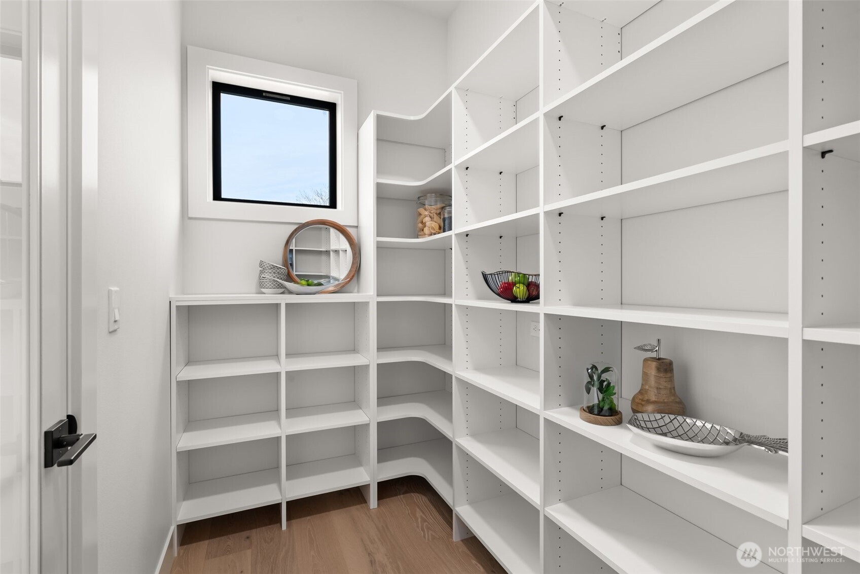 1422 Sequalish Street Steilacoom, WA 98388 - Photo 12 of 34 a view of walk in closet with empty racks