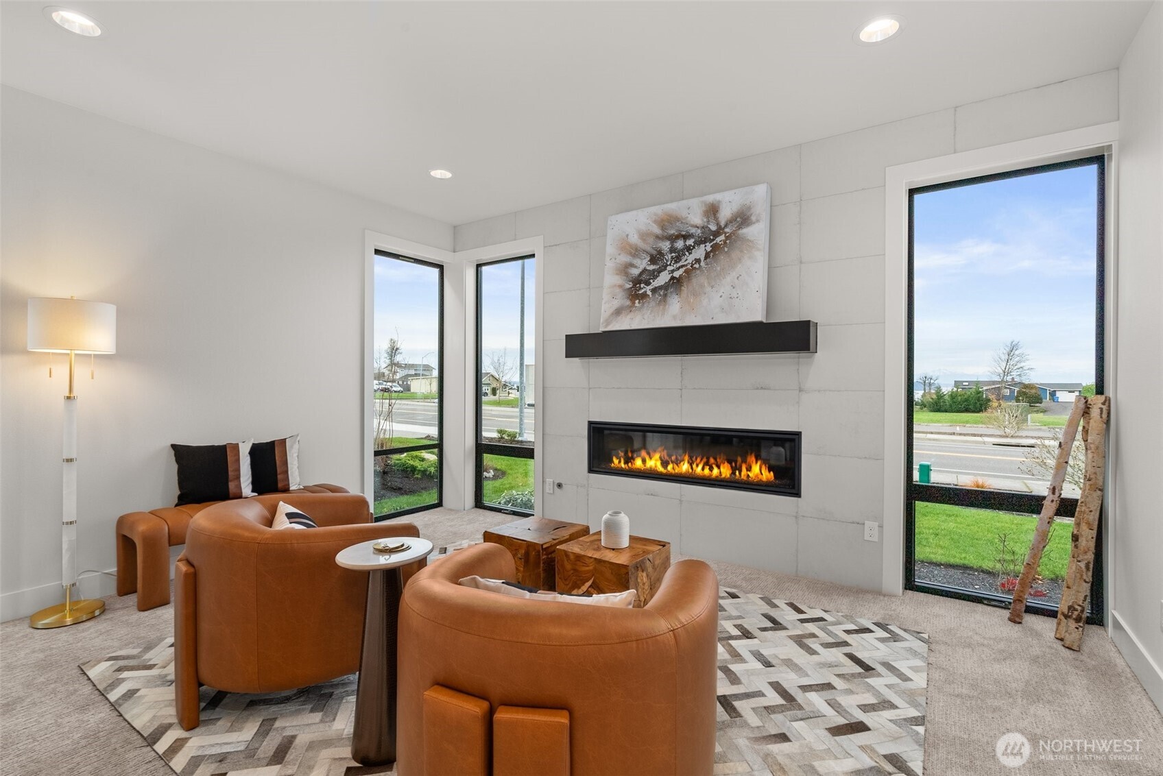 1422 Sequalish Street Steilacoom, WA 98388 - Photo 24 of 34 a living room with furniture a window and a flat screen tv
