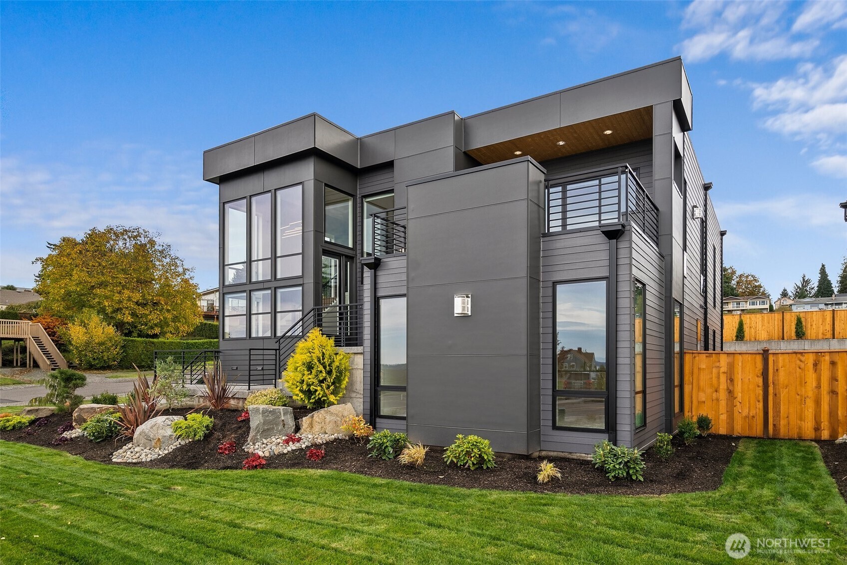 1422 Sequalish Street Steilacoom, WA 98388 - Photo 32 of 34 a backyard of a house with lots of green space and fountain