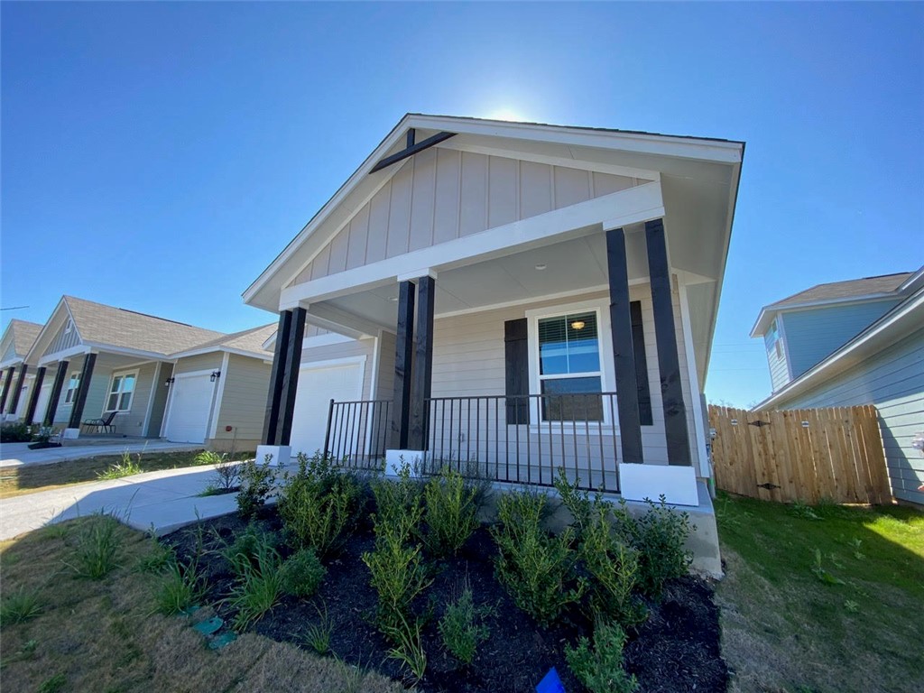 237 Michaelis Drive Leander, TX 78641 - Photo 1 of 23 a front view of a house with garden