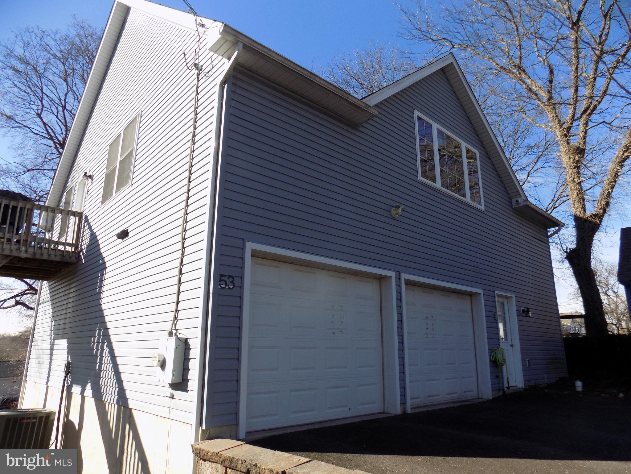 53 Sunset Avenue, Unit 3 Chalfont, PA 18914 - Photo 1 of 20 a view of a house with a door