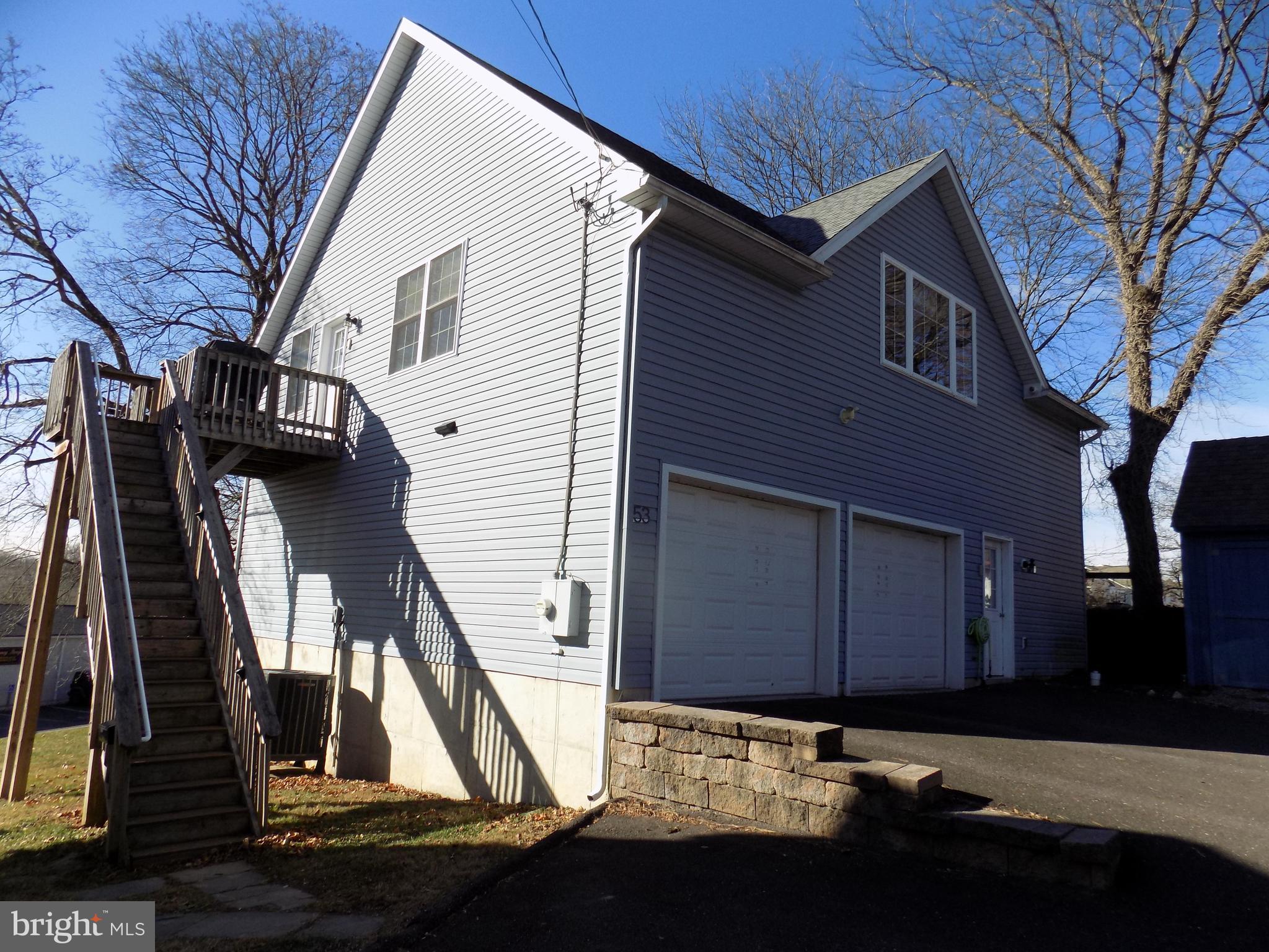 53 Sunset Avenue, Unit 3 Chalfont, PA 18914 - Photo 2 of 20 a view of a house with a door