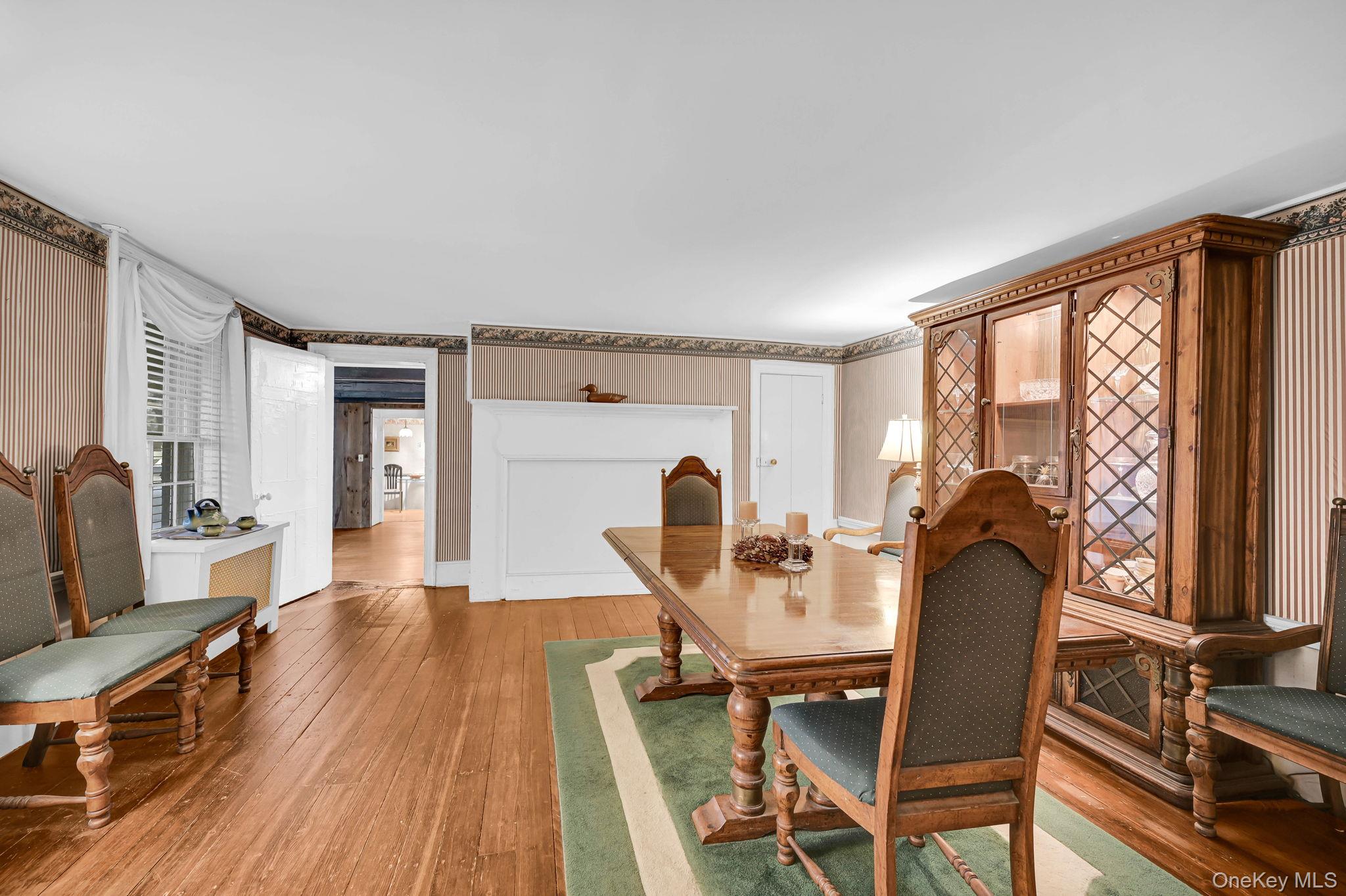 33 Ryder Road Ossining, NY 10562 - Photo 13 of 48 Dining space with hardwood / wood-style floors and radiator