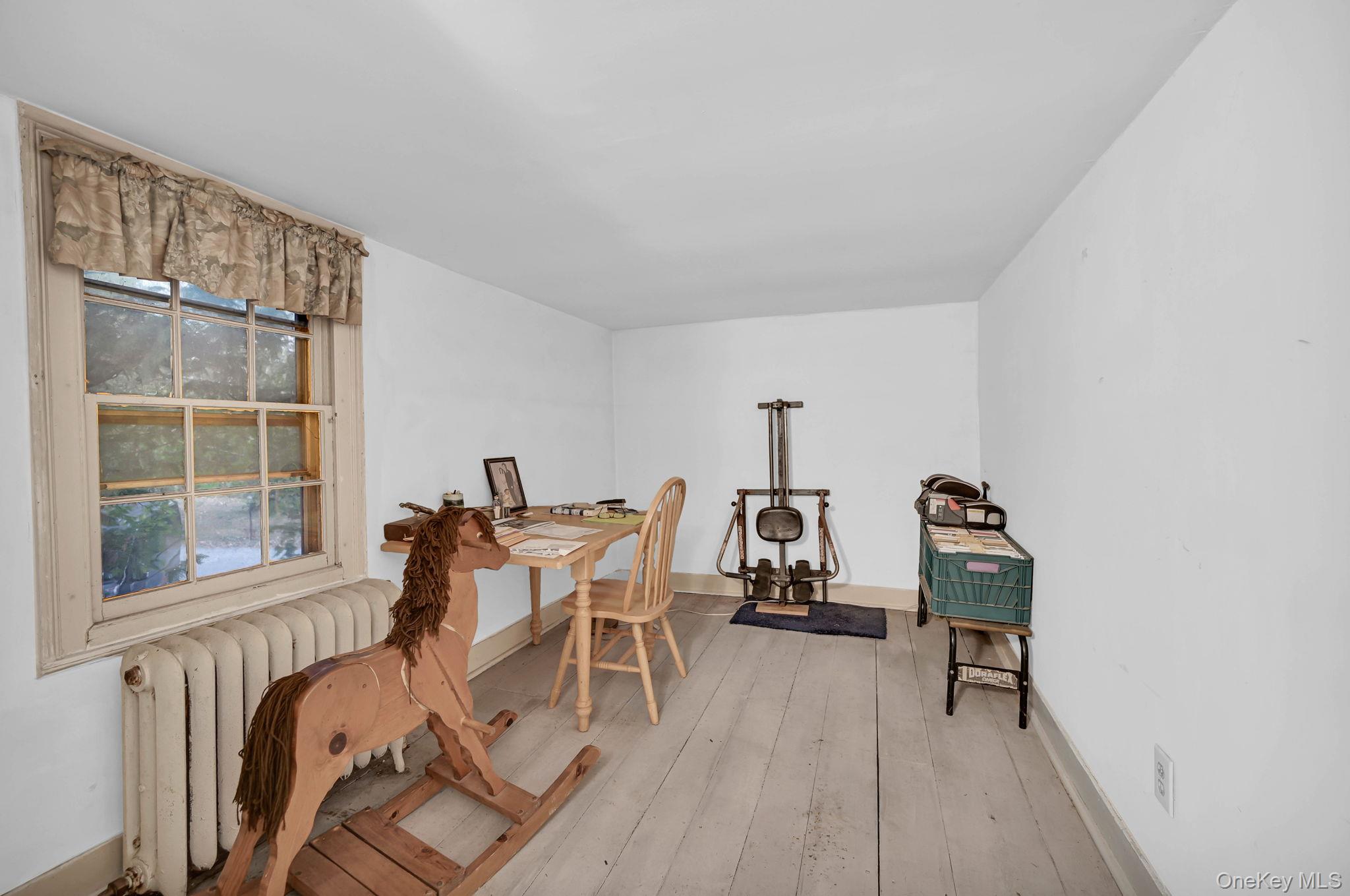 33 Ryder Road Ossining, NY 10562 - Photo 21 of 48 Office space with radiator and light wood-style floors