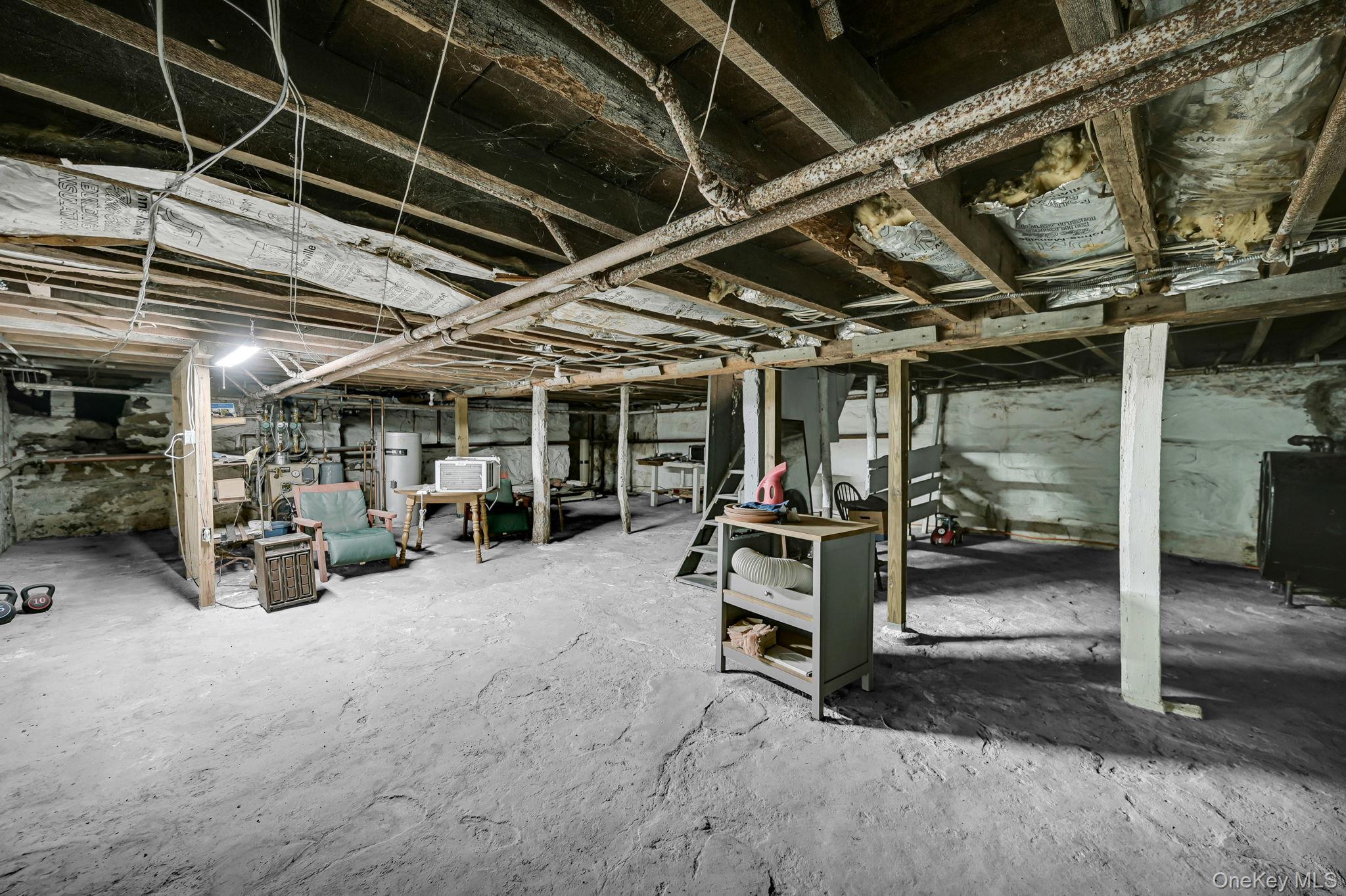 33 Ryder Road Ossining, NY 10562 - Photo 32 of 48 Unfinished basement featuring heating fuel and water heater