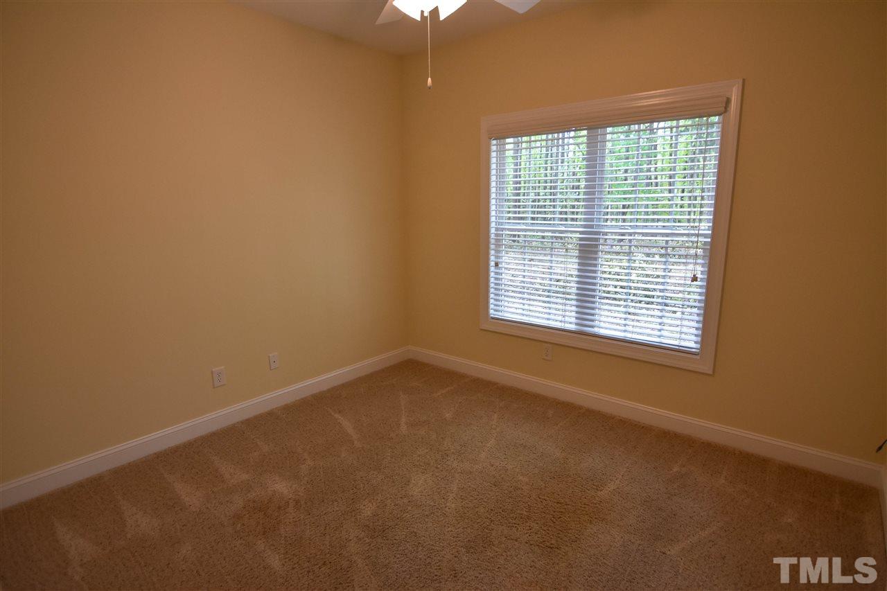 292 Ned Moore Road Timberlake, NC 27583 - Photo 16 of 25 a view of an empty room with a window