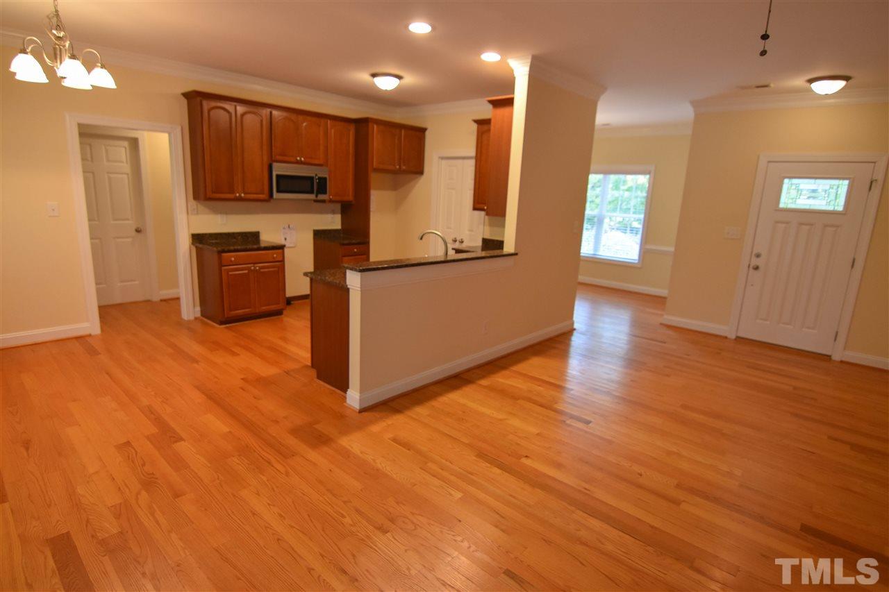 292 Ned Moore Road Timberlake, NC 27583 - Photo 3 of 25 a view of kitchen with microwave and refrigerator