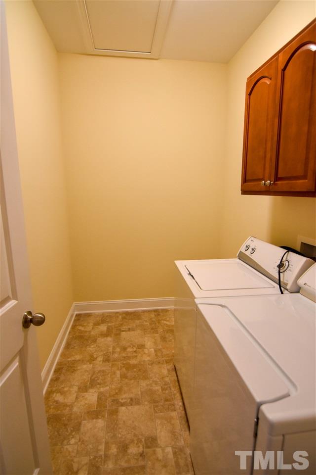 292 Ned Moore Road Timberlake, NC 27583 - Photo 21 of 25 a bathroom with a bathtub
