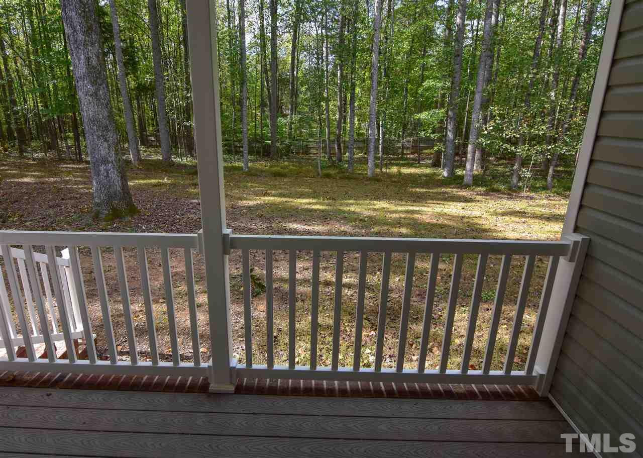 292 Ned Moore Road Timberlake, NC 27583 - Photo 24 of 25 a view of a wooden balcony