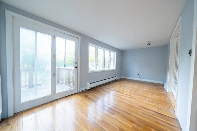 a view of an empty room and window