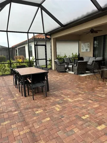 a view of a lake with houses in the back