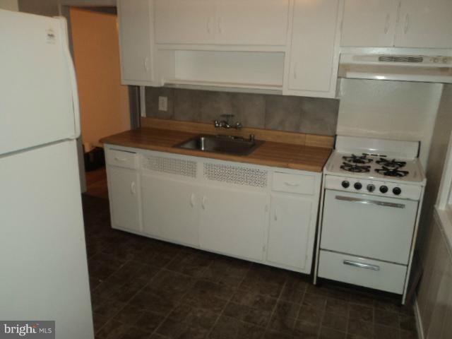 4304 Randolph Road Silver Spring, MD 20906 - Photo 12 of 14 a utility room with dryer and washer