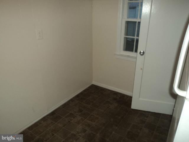 4304 Randolph Road Silver Spring, MD 20906 - Photo 3 of 14 an empty room with a door