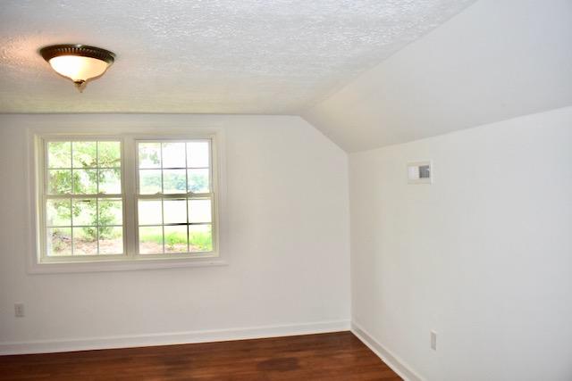 13753 West Gretna Road Sandy Level, VA 24161 - Photo 44 of 99 an empty room with wooden floor and windows