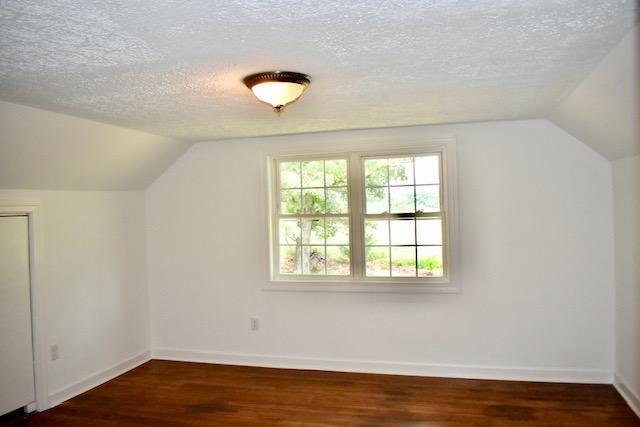 13753 West Gretna Road Sandy Level, VA 24161 - Photo 57 of 99 an empty room with wooden floor and windows