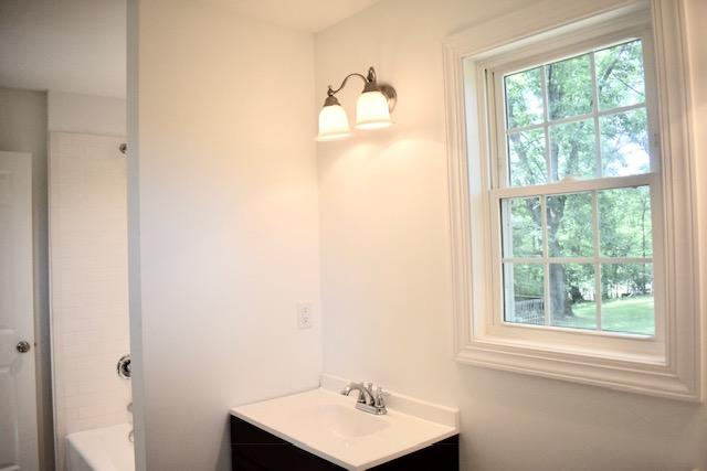 13753 West Gretna Road Sandy Level, VA 24161 - Photo 75 of 99 a bathroom with a sink and mirror