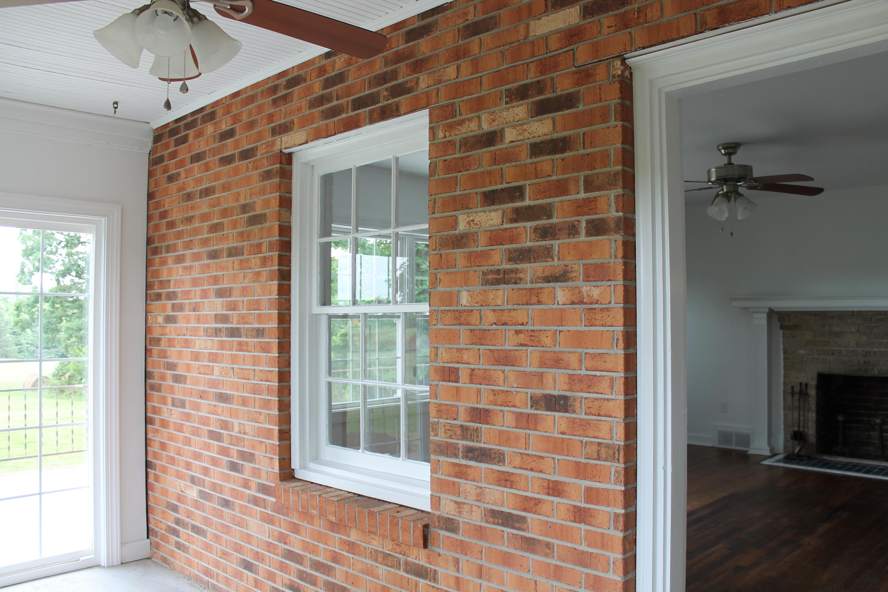 13753 West Gretna Road Sandy Level, VA 24161 - Photo 85 of 99 a view of a brick house with a fireplace