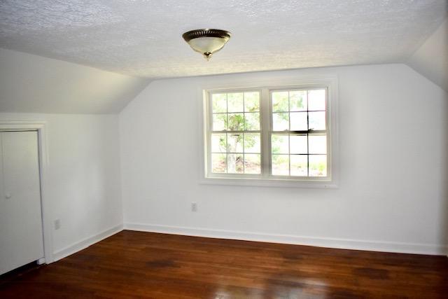 13753 West Gretna Road Sandy Level, VA 24161 - Photo 87 of 99 an empty room with wooden floor and windows