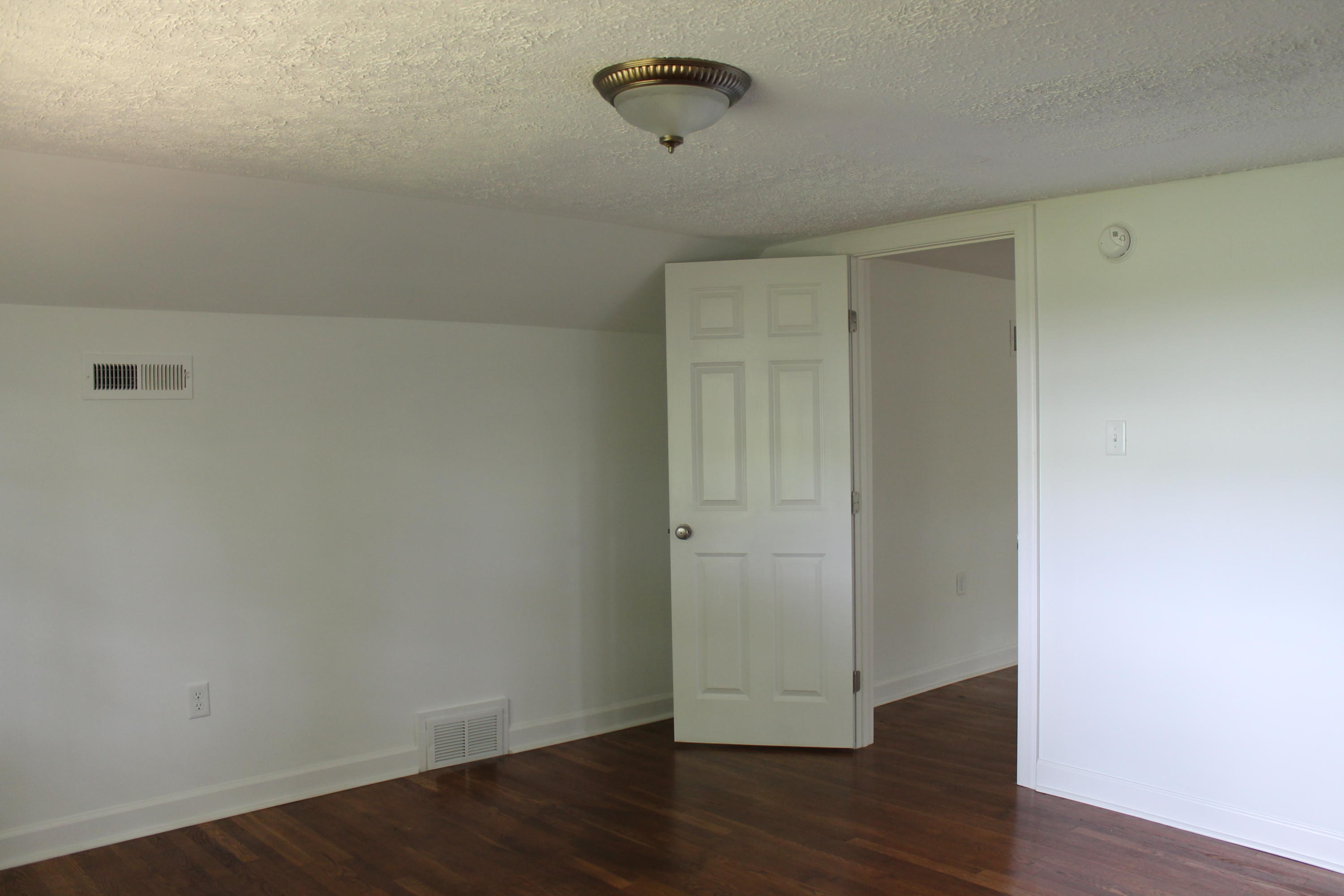 13753 West Gretna Road Sandy Level, VA 24161 - Photo 88 of 99 a view of a room with wooden floor