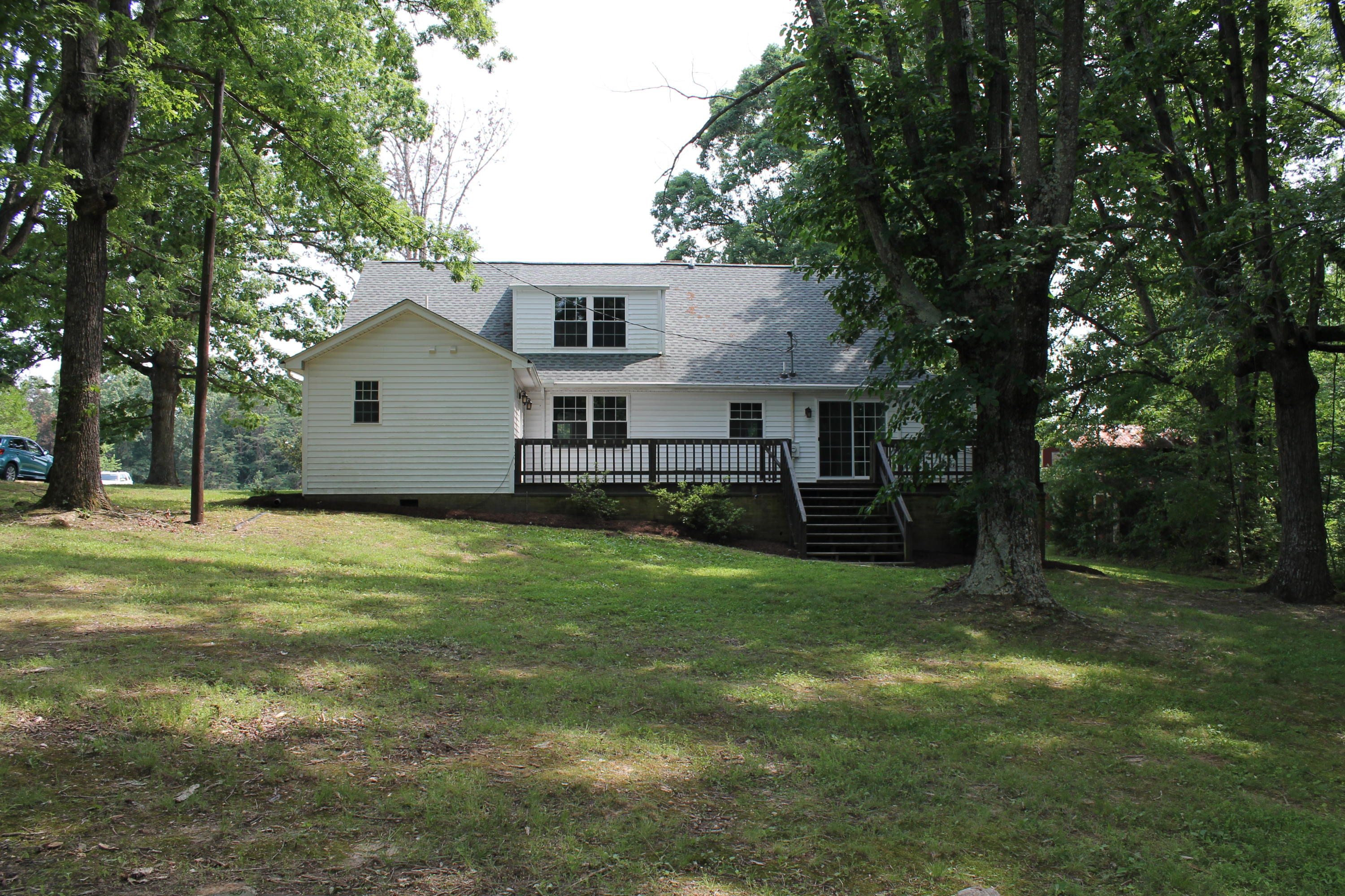 13753 West Gretna Road Sandy Level, VA 24161 - Photo 90 of 99 a view of a house with backyard and tree