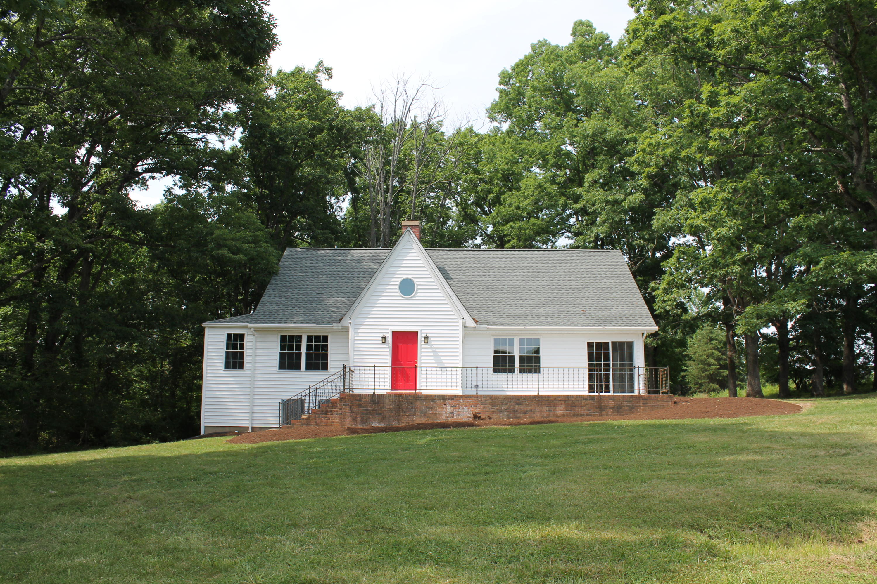 13753 West Gretna Road Sandy Level, VA 24161 - Photo 92 of 99 a front view of a house with a garden