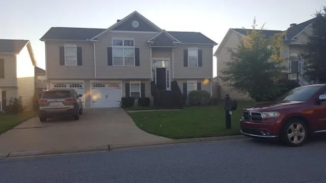 a car parked in front of a house