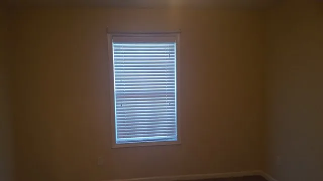 a view of a room that has a window in it