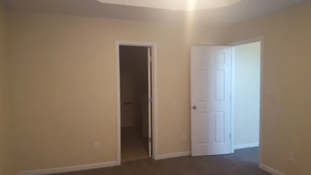 a view of hallway with closet