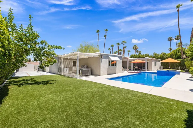 a view of a house with a swimming pool