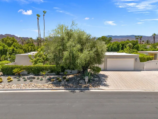 a view of a house with a street view