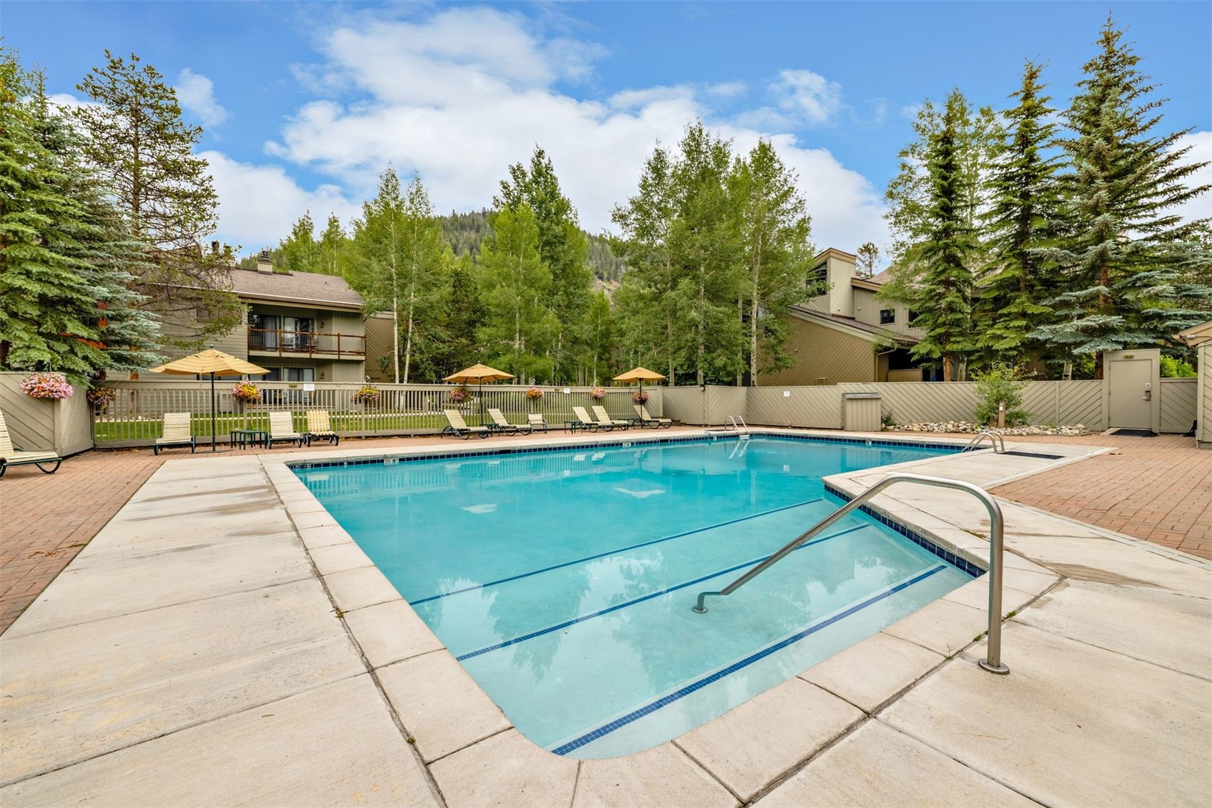 1977 Soda Ridge Road, Unit 1194 Keystone, CO 80435 - Photo 32 of 38 a view of a backyard with sitting area