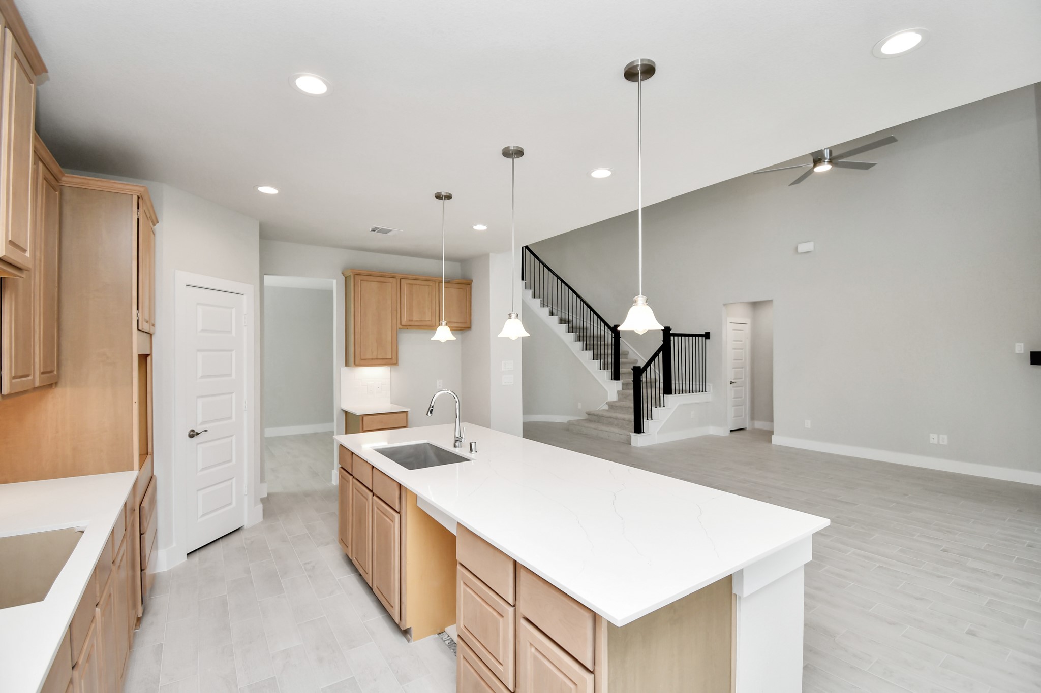 3106 Skerne Spring Dr Spring Spring, TX 77373 - Photo 16 of 47 All of this overlooks your expansive family room, creating a perfect space for culinary delights and family gatherings.