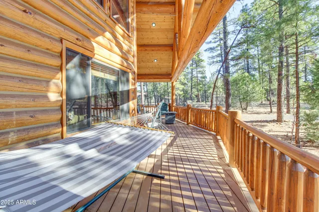 a view of porch with wooden floor and outdoor seating