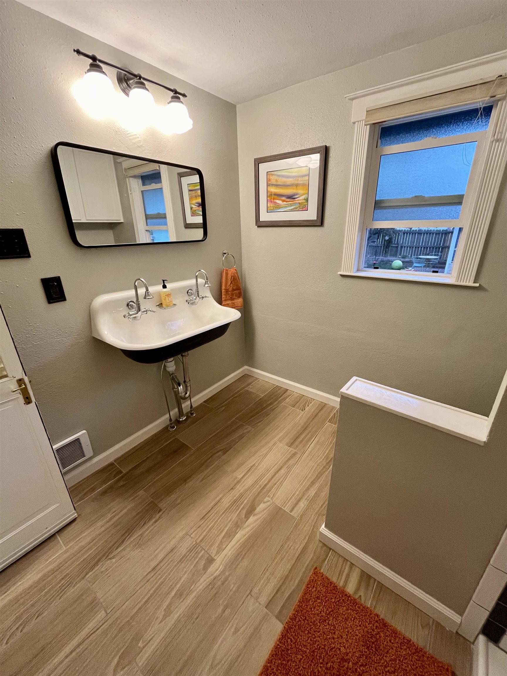 1244 Main Street Grand Junction, CO 81501 - Photo 17 of 33 a room with table and mirror