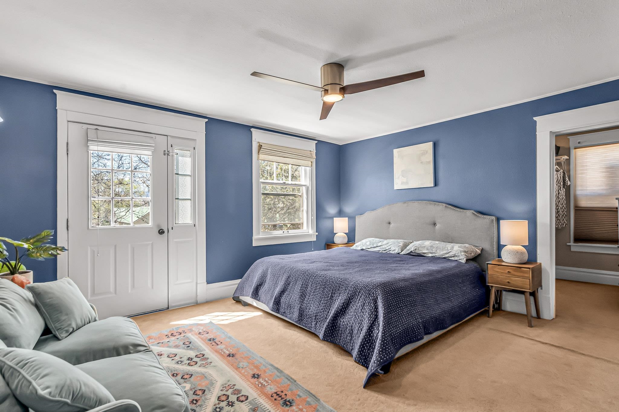 1244 Main Street Grand Junction, CO 81501 - Photo 20 of 33 a bedroom with a bed couch and window