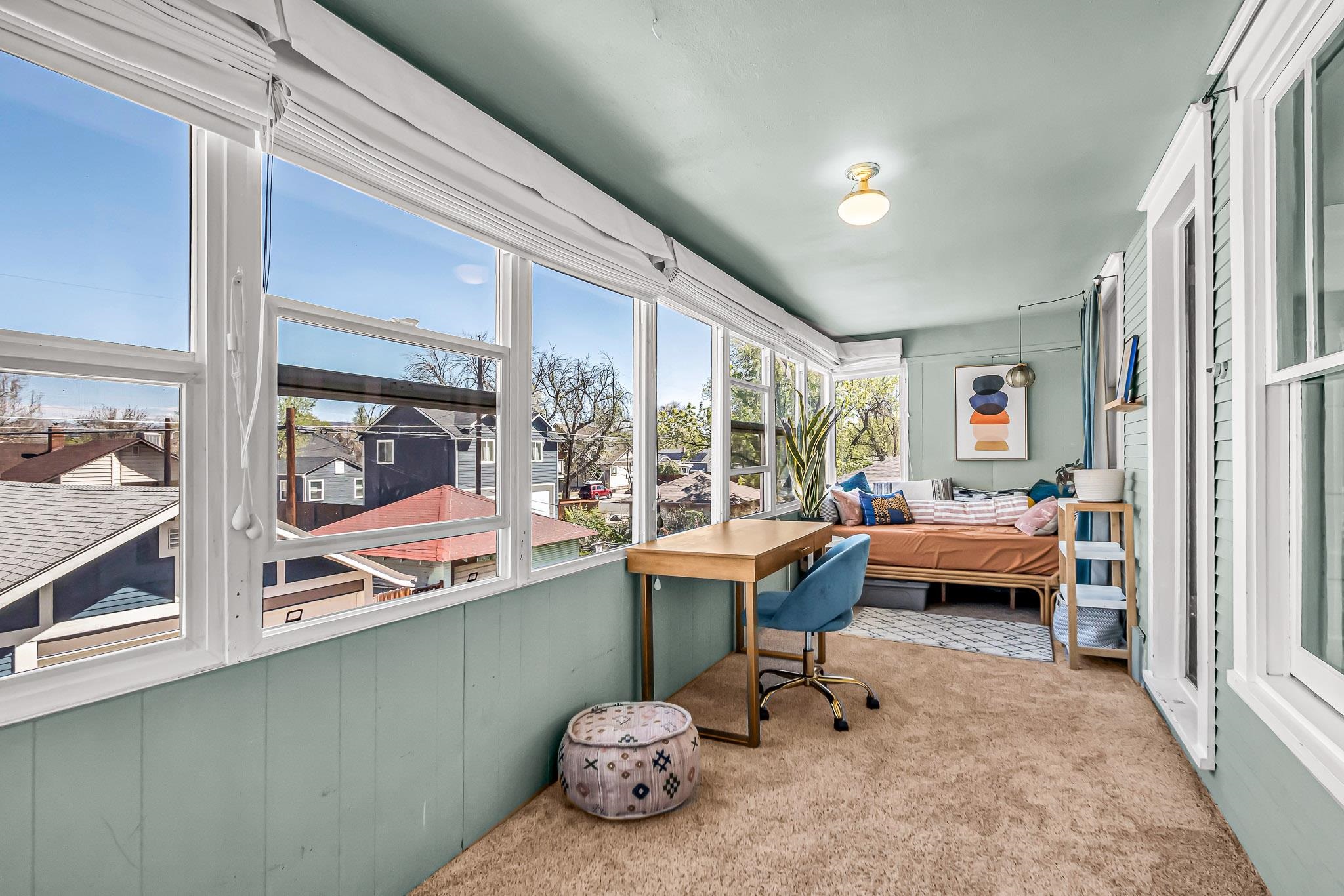 1244 Main Street Grand Junction, CO 81501 - Photo 25 of 33 a bedroom with furniture and a large window