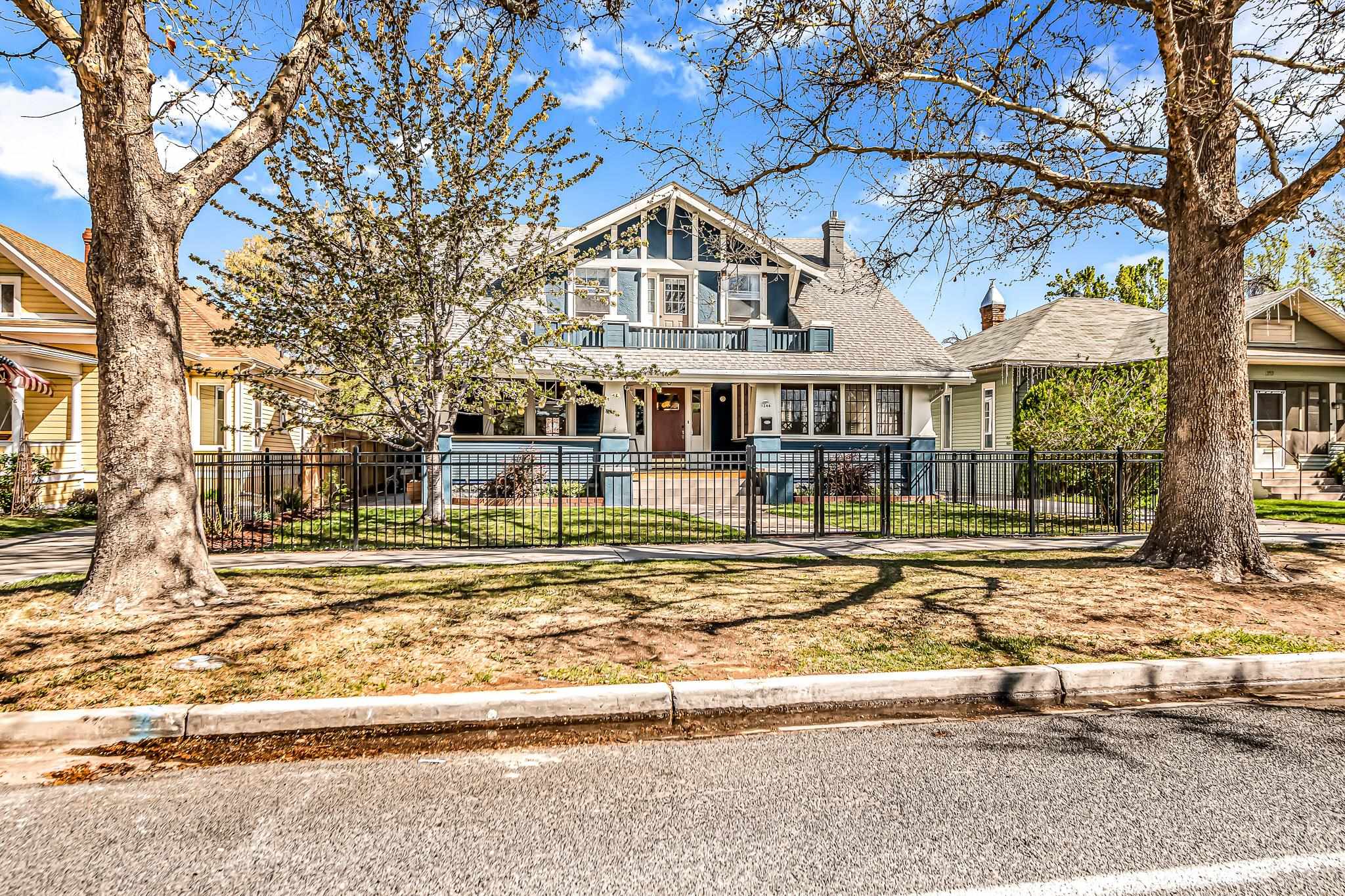 1244 Main Street Grand Junction, CO 81501 - Photo 3 of 33 front view of a house with a yard