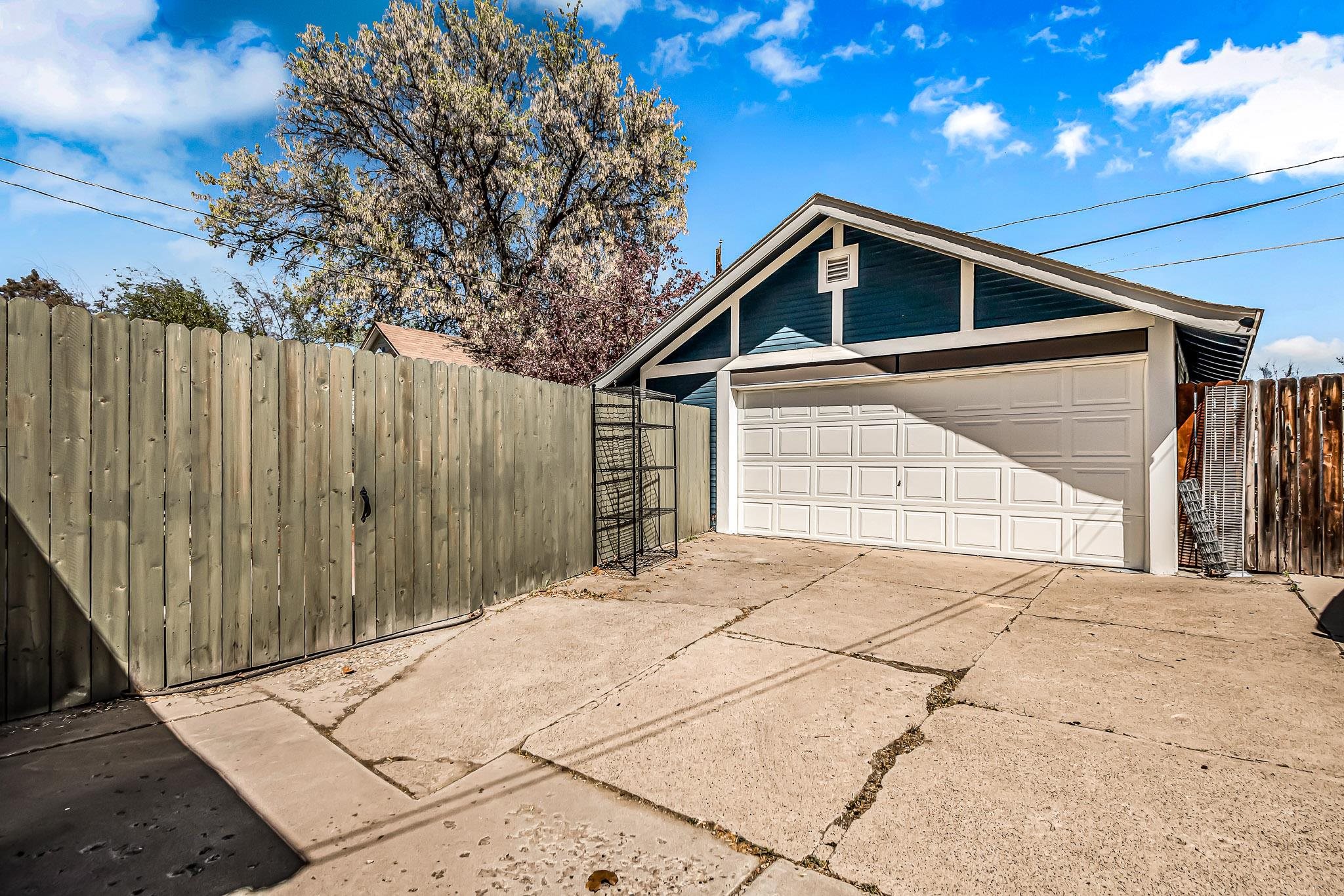 1244 Main Street Grand Junction, CO 81501 - Photo 32 of 33 a view of backyard of house with wooden fence
