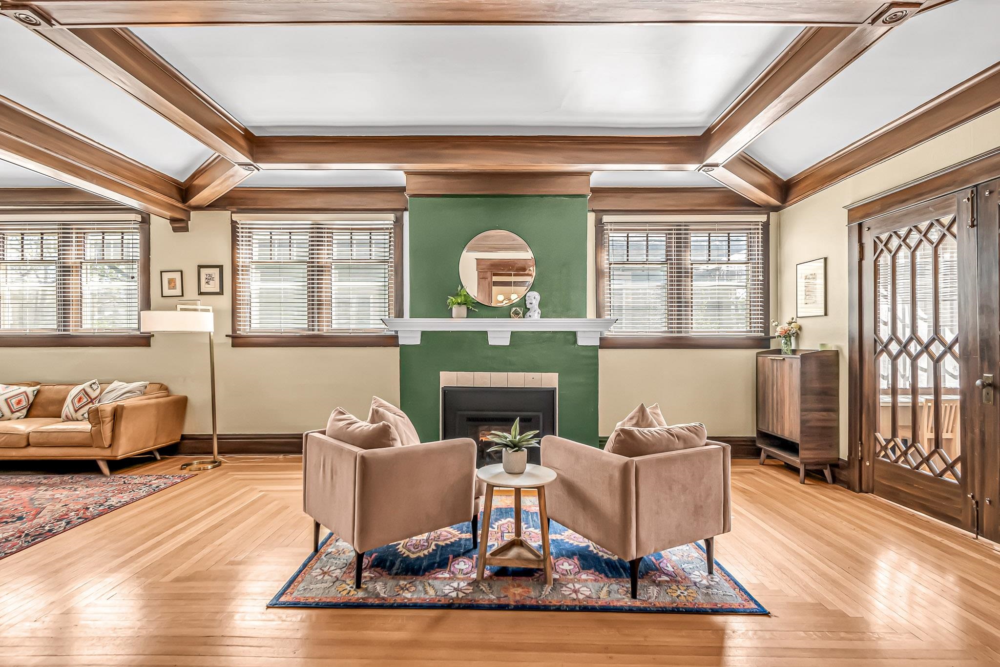 1244 Main Street Grand Junction, CO 81501 - Photo 6 of 33 a living room with furniture a rug and a fireplace