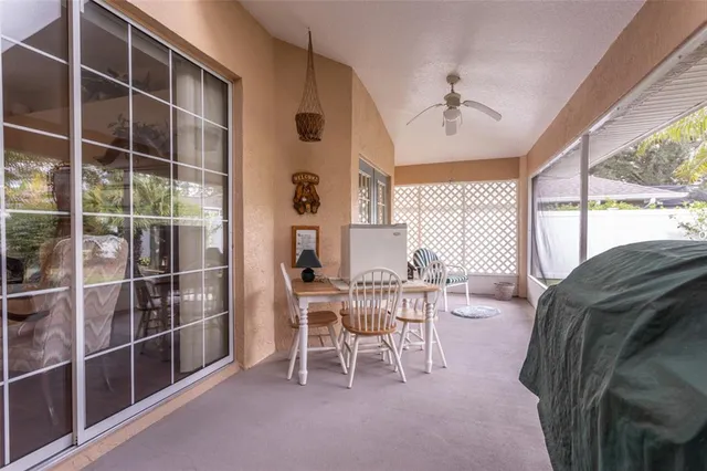 a view of a livingroom with furniture and window