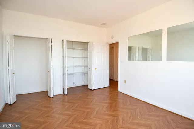 a bathroom with a double vanity sink and mirror