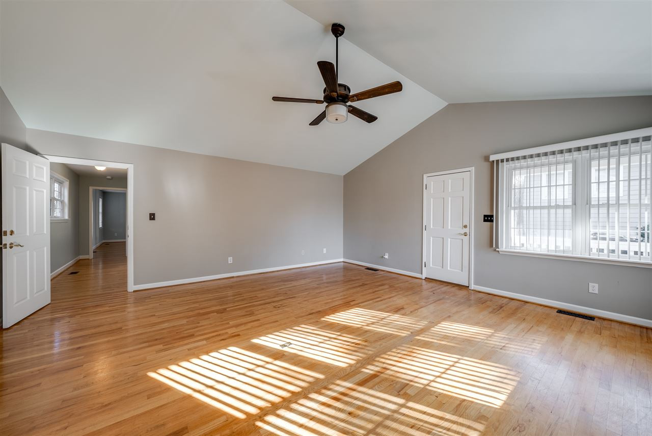 703 Kimbrough Street Raleigh, NC 27608 - Photo 9 of 25 Gather everyone in the spacious family room off of the kitchen for your next holiday party! Family Room