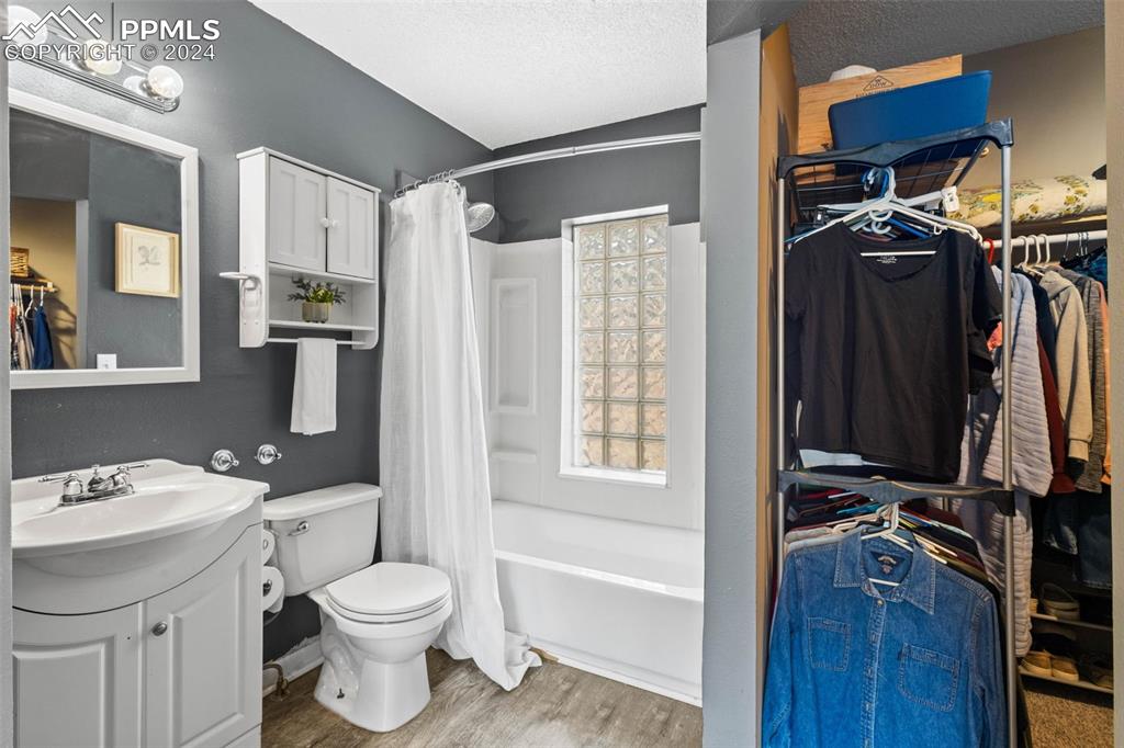 8228 Highway 24 Cascade, CO 80809 - Photo 12 of 34 a bathroom with a sink toilet and shower