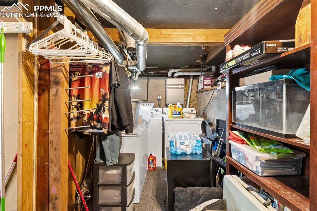 8228 Highway 24 Cascade, CO 80809 - Photo 16 of 34 a view of walk in closet with clothes and shoes