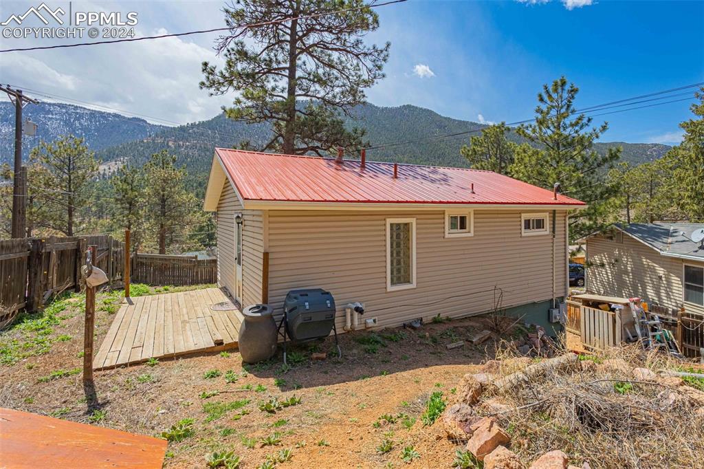 8228 Highway 24 Cascade, CO 80809 - Photo 23 of 34 a view of a backyard with a small yard