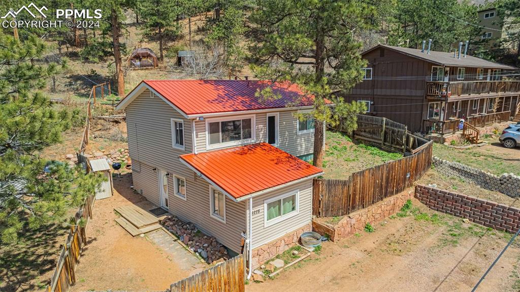 8228 Highway 24 Cascade, CO 80809 - Photo 24 of 34 an aerial view of residential house with wooden fence