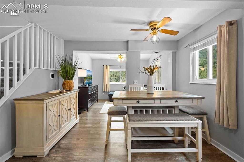 8228 Highway 24 Cascade, CO 80809 - Photo 3 of 34 a kitchen with stainless steel appliances granite countertop a stove a sink dishwasher and cabinets