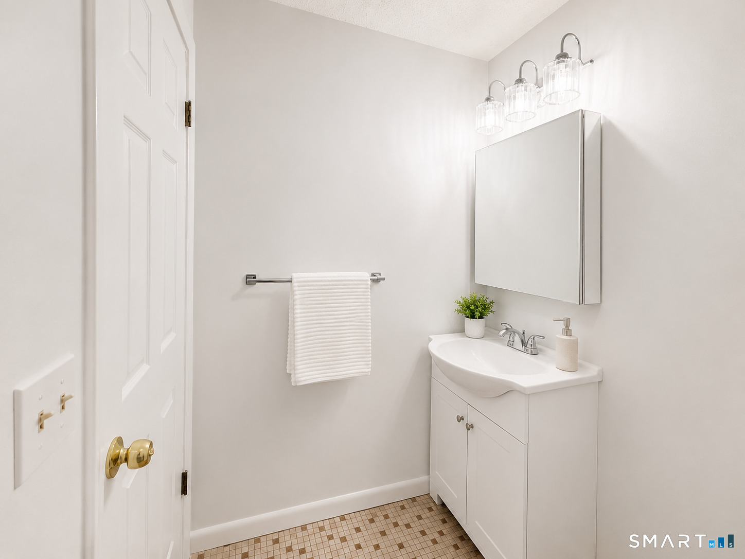 914 High Path Road, Unit 914 Windsor, CT 06095 - Photo 11 of 23 a bathroom with a sink and mirror