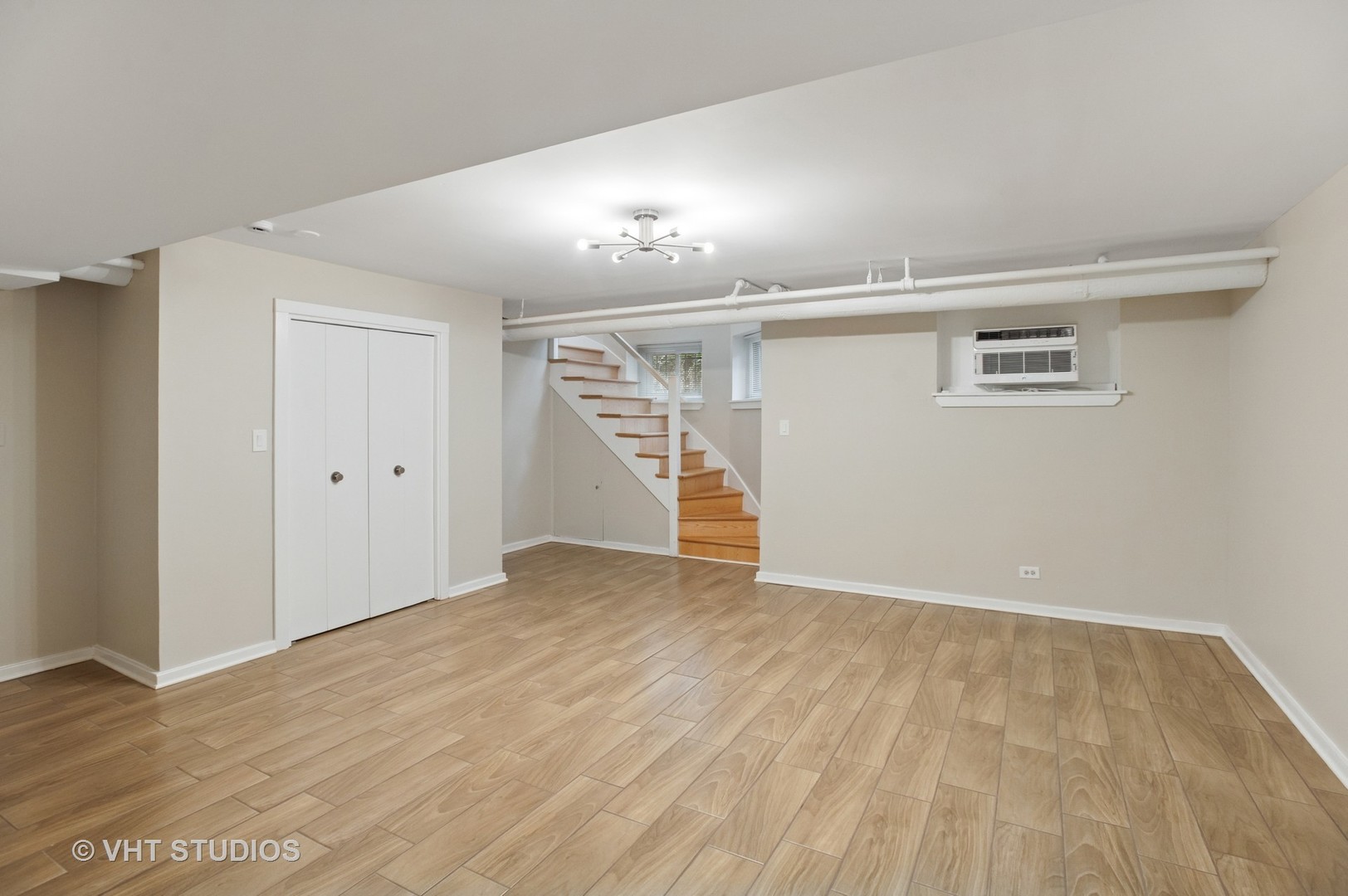 550 West Brompton Avenue, Unit 1S Chicago, IL 60657 - Photo 18 of 28 a view of empty room with wooden floor